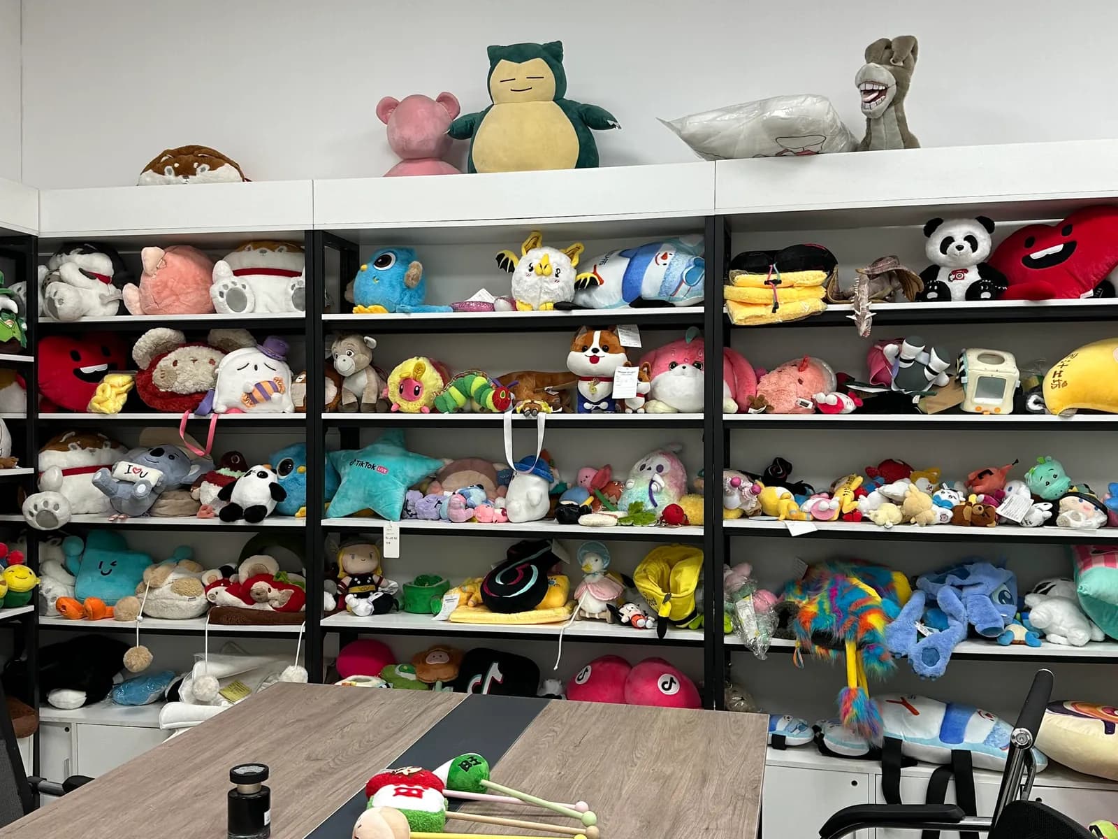 Sample shelves of custom plush toys in our Shenzhen showroom