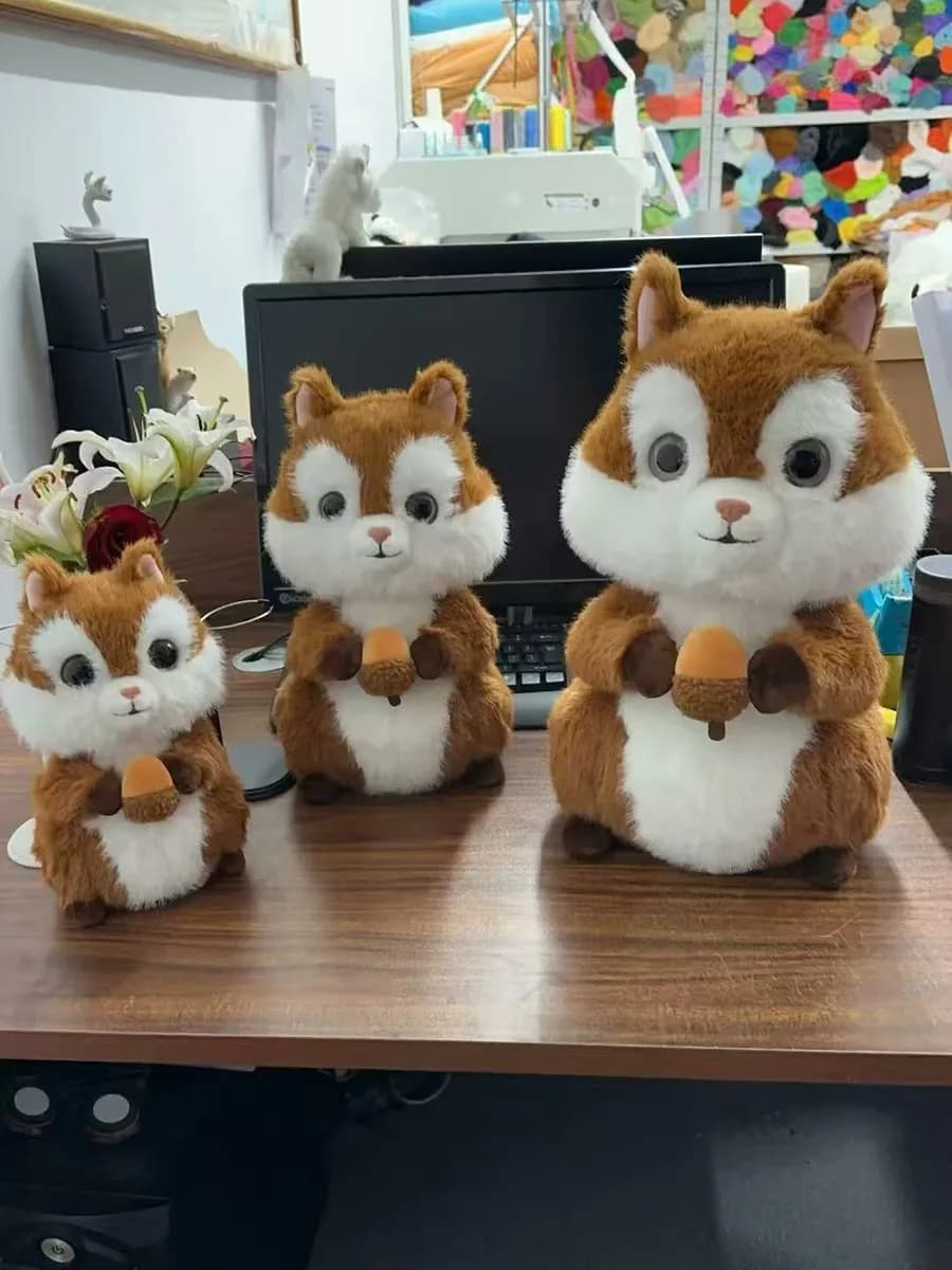 One squirrel plush design made in three sizes, lined up in our Shenzhen workshop