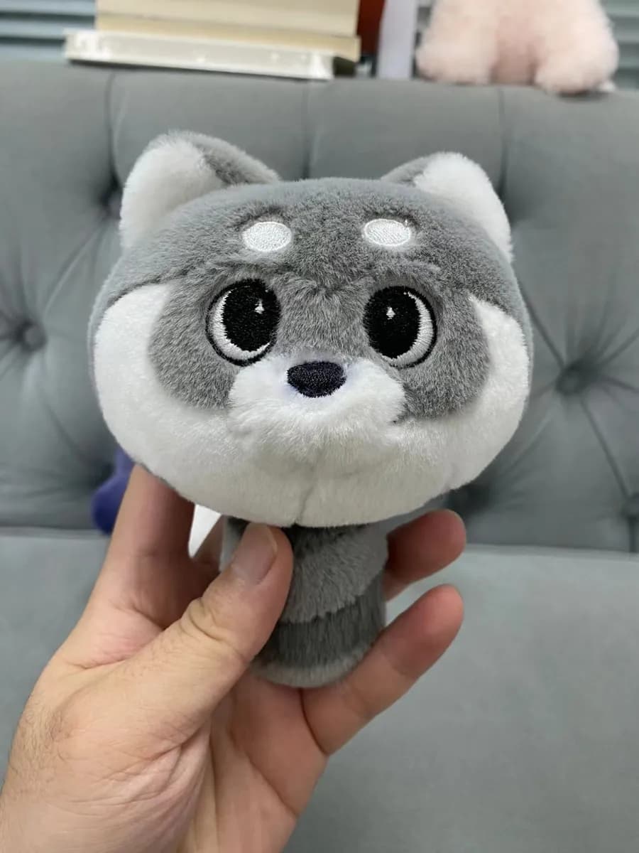 Grey wolf plush toy with airbrushed shading on the muzzle