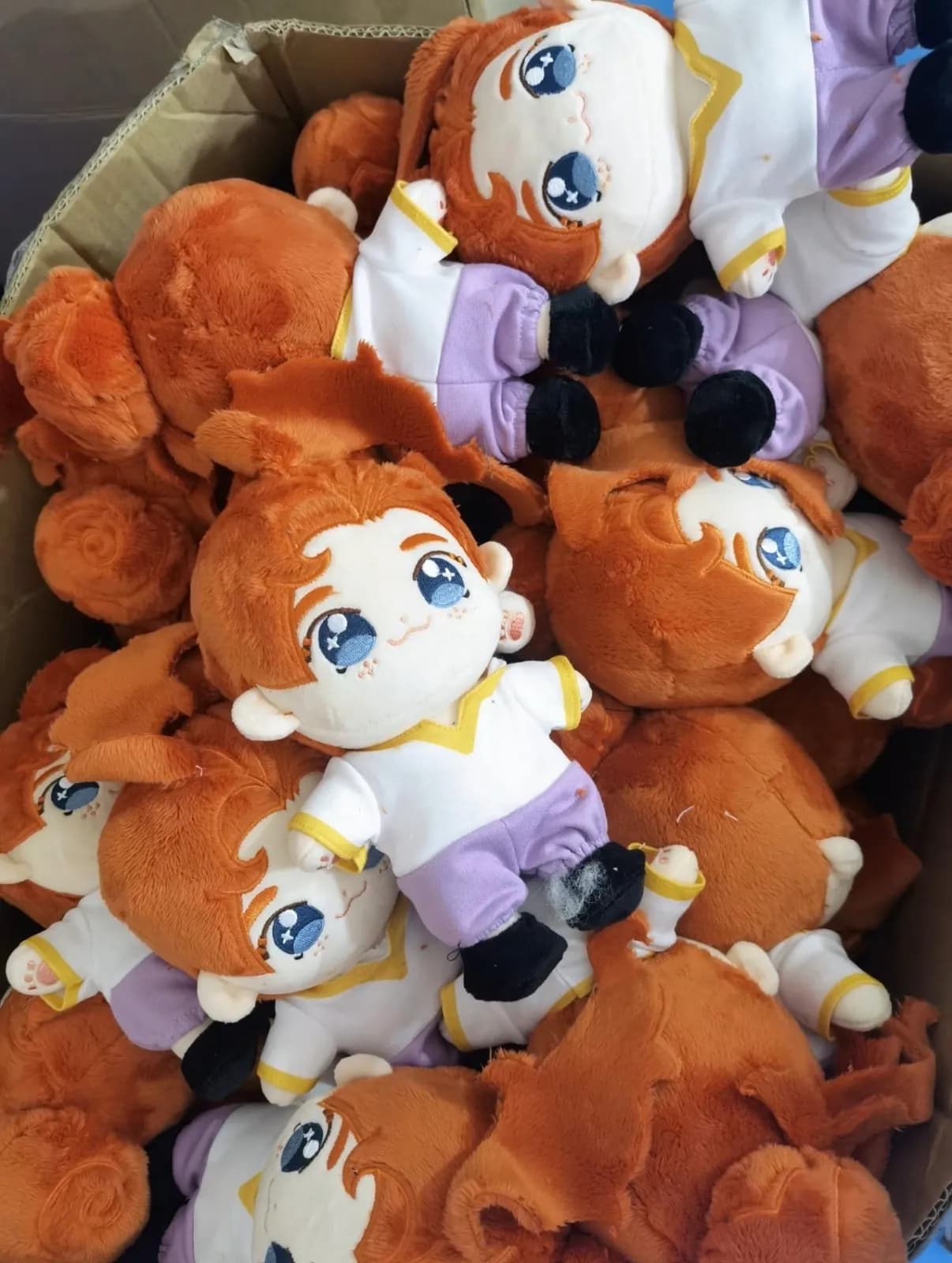 Bulk run of character dolls before hangtag attachment