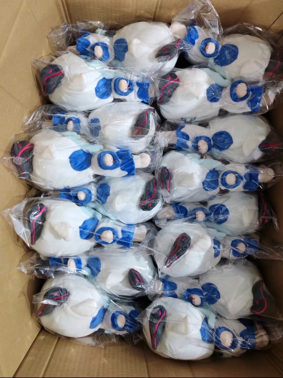 Bulk run of white claw machine plush toys awaiting inspection