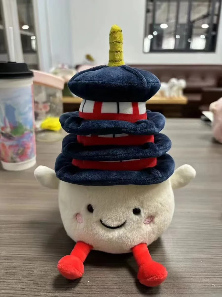 Stacked burger character plush toy with embroidered smile and legs