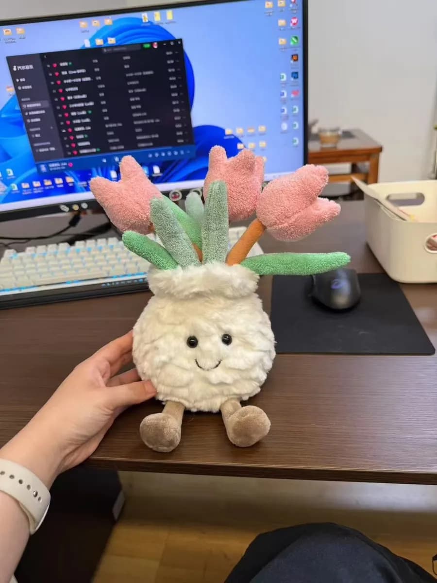 Dandelion character plush toy with a fluffy seed head