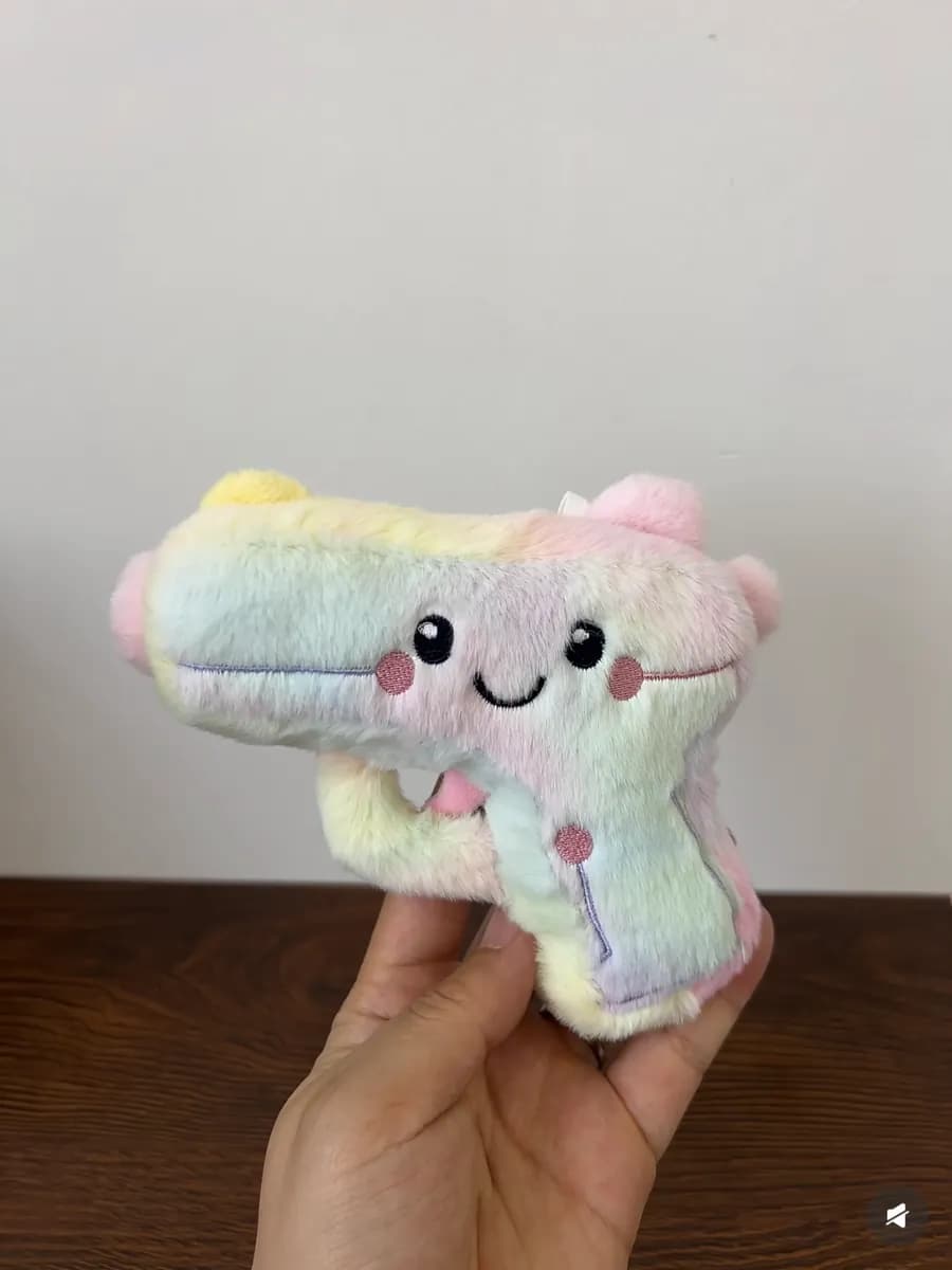 Rainbow tie-dye plush toy in printed fabric