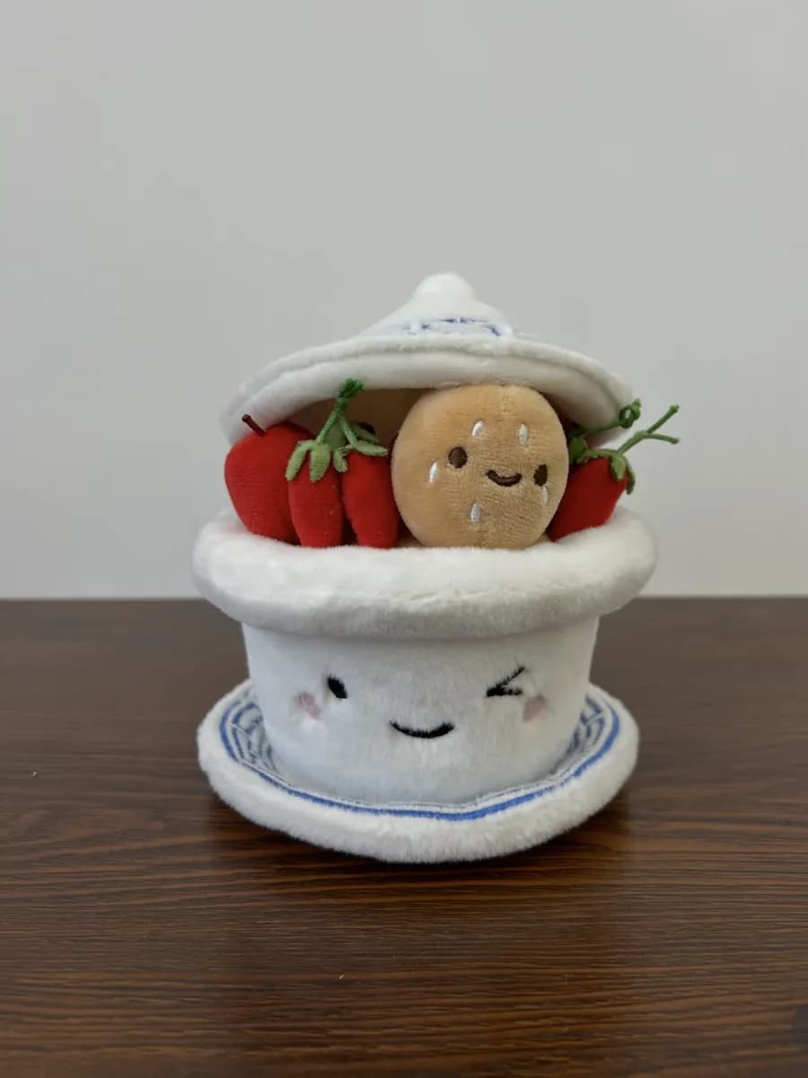 Strawberry pot plush toy with a removable topper