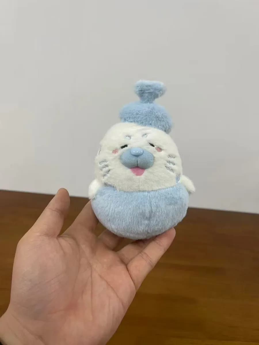Porcelain teapot character plush toy with a blue and white print