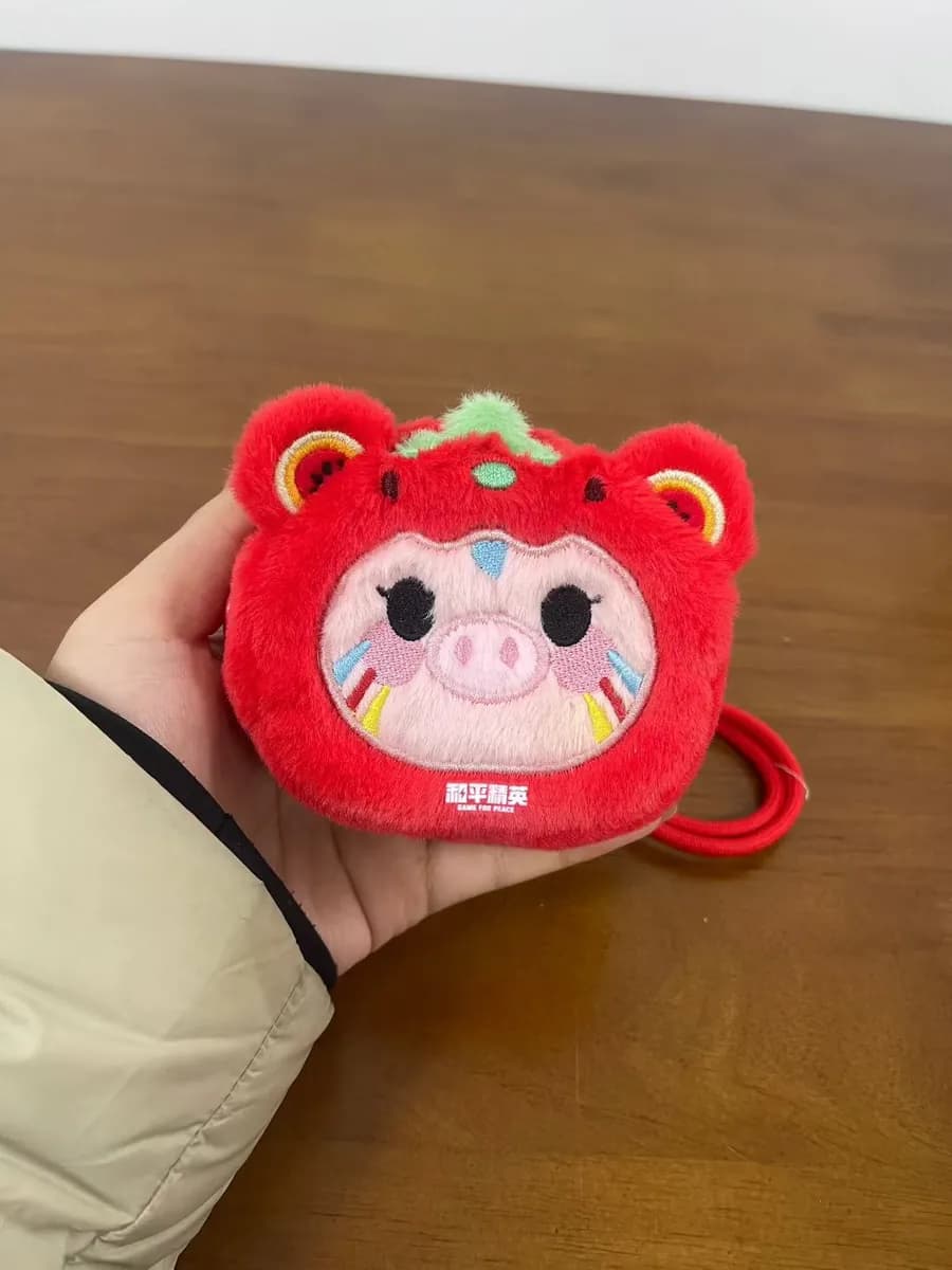 Tomato pig plush coin purse with a 3D leaf detail