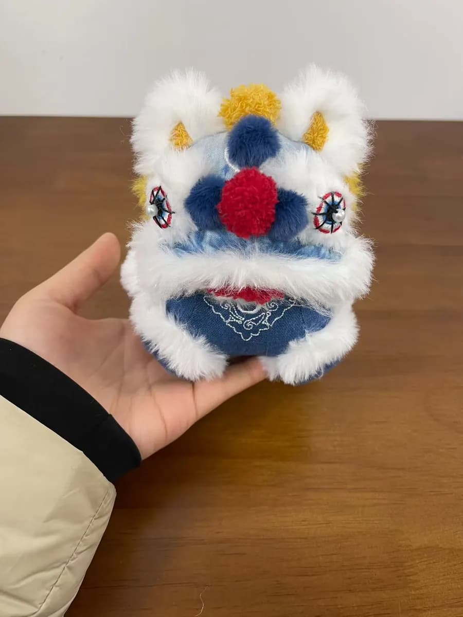 Lion dance plush souvenir with fringe trim