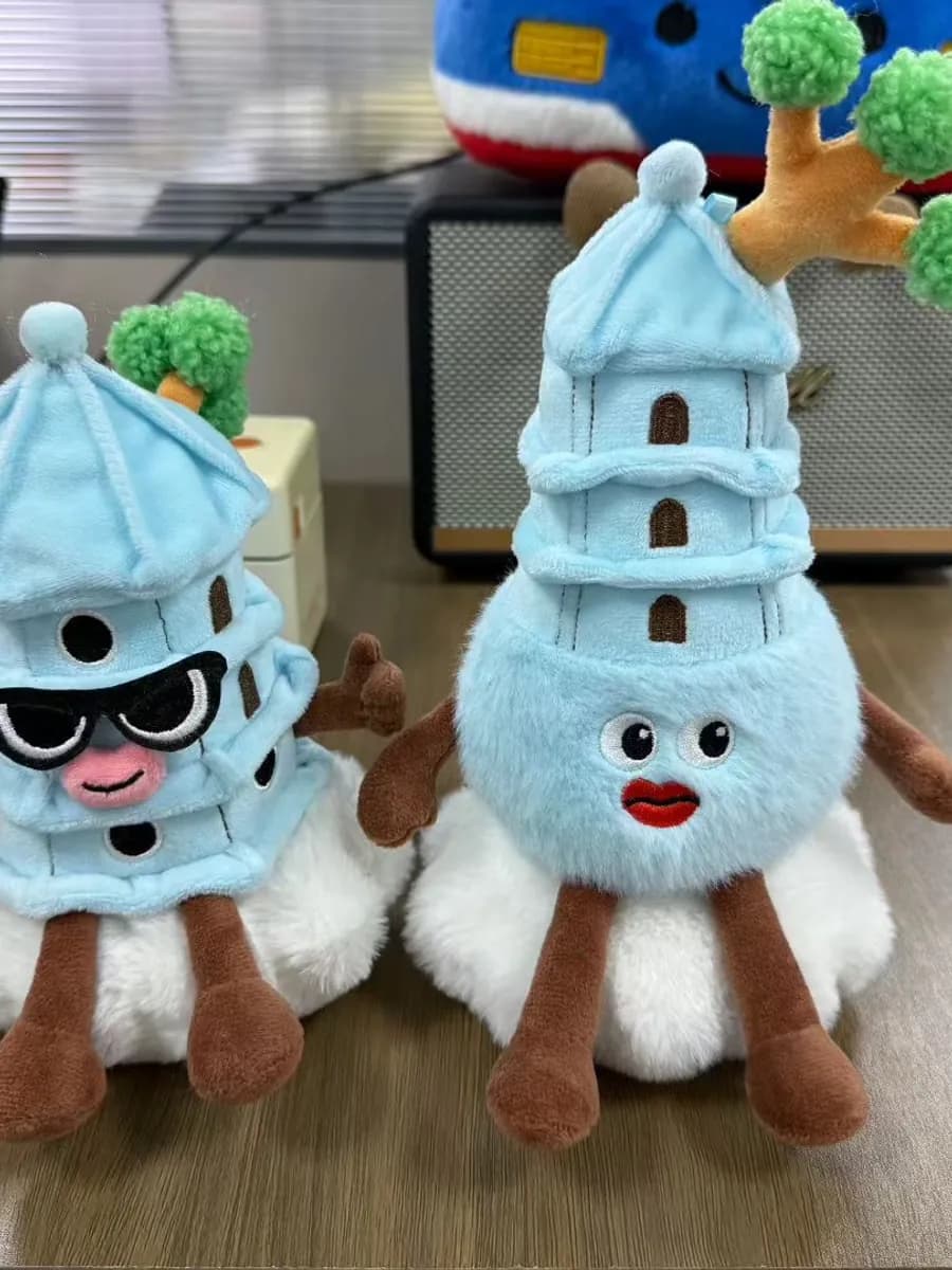 Three pagoda plush souvenirs in different colourways