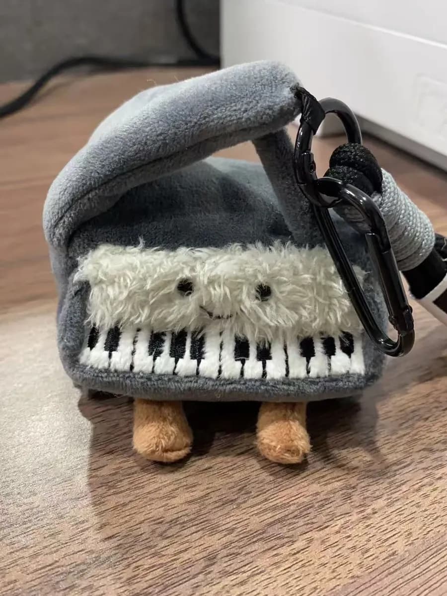 Piano keyboard plush bag with a shoulder strap